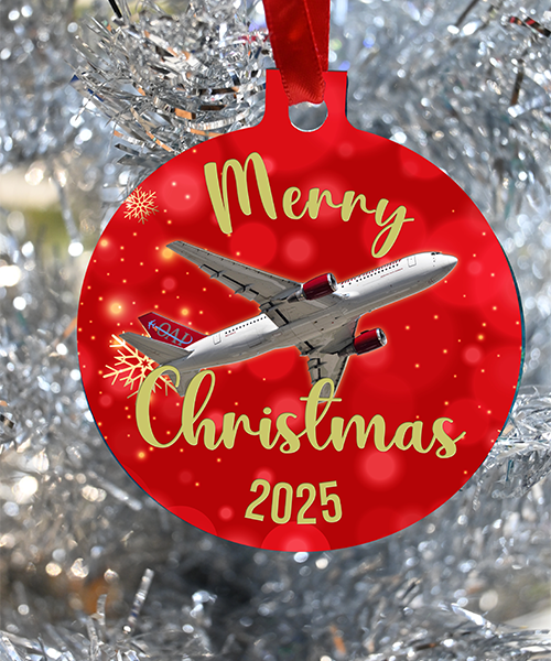 Omni Air Internatiional christmas ornament for the holidays 2024. This ornament features the 777 or 767 aircraft of Omni Air for Pilots, Mechanics , Flight Attendants and Load Masters of Omni